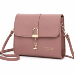 Mauve crossbody handbag with gold accents